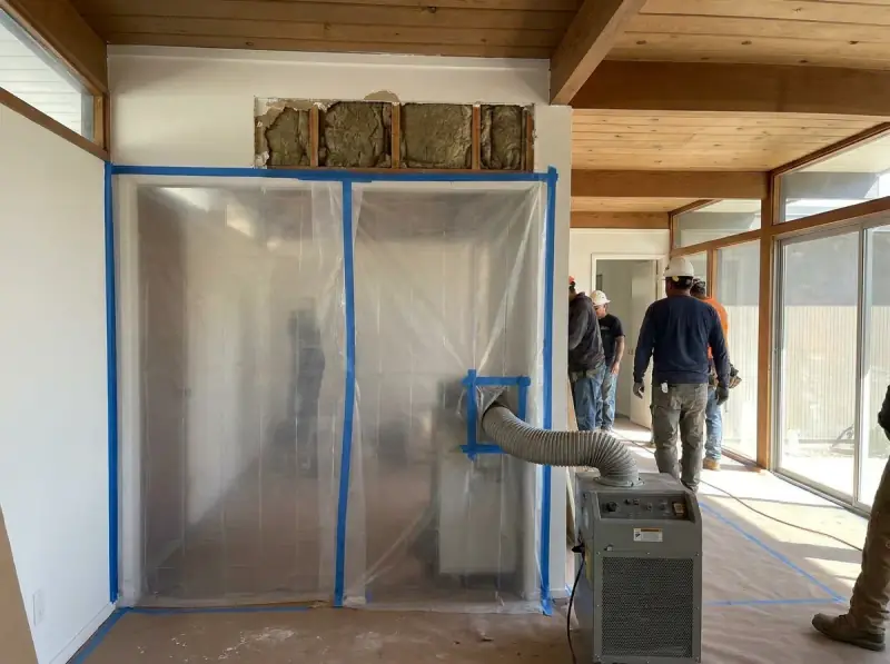 Plastic containment with a negative air machine and flood-cut drywall in Cupertino, California